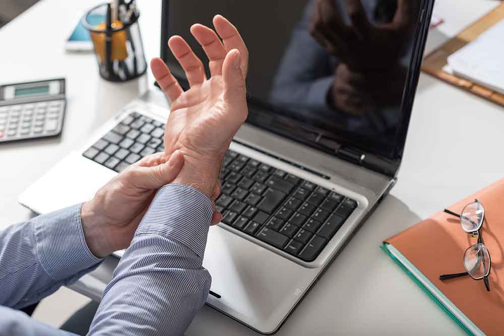 Man Holding Painful Wrist